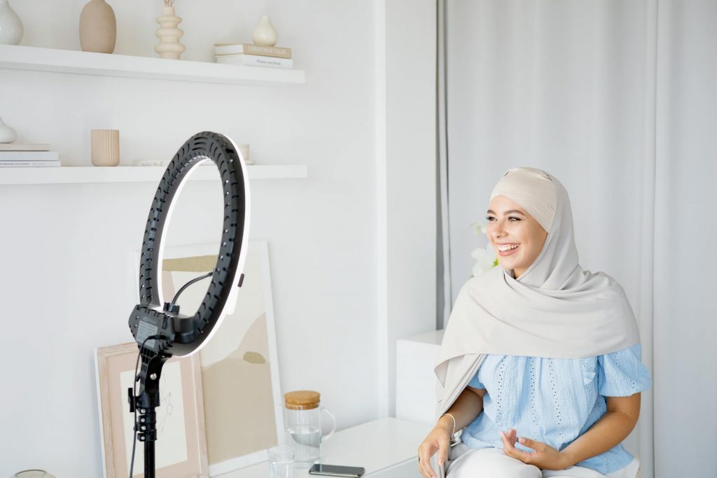 Happy Woman in a Hijab Vlogging